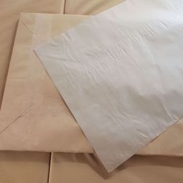 Picture of 8kg X MANDINI BROWN PAPER SHEETS